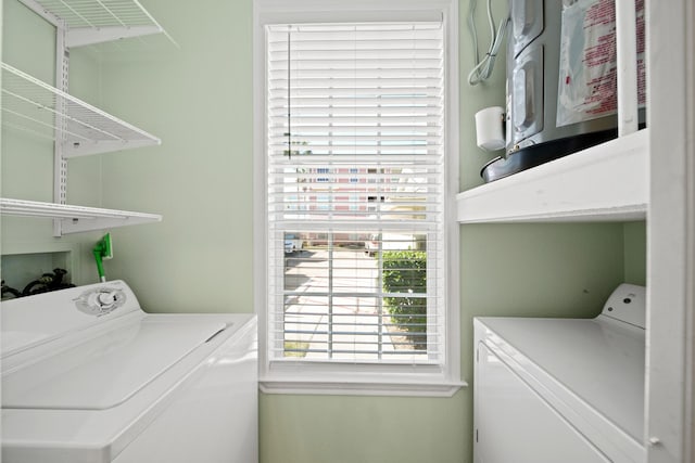 laundry area with washing machine and dryer and laundry area