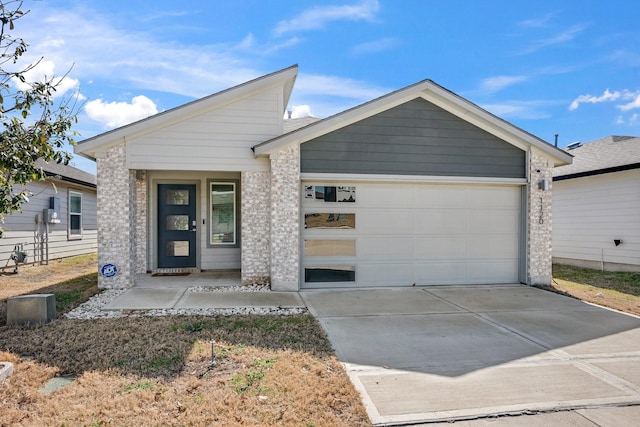 view of front of house with driveway and an attached garage