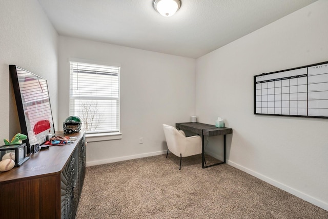 home office with carpet floors and baseboards