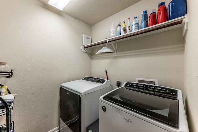 laundry area featuring laundry area and washing machine and clothes dryer