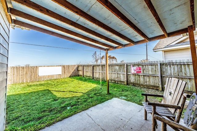 view of yard with a patio area and a fenced backyard