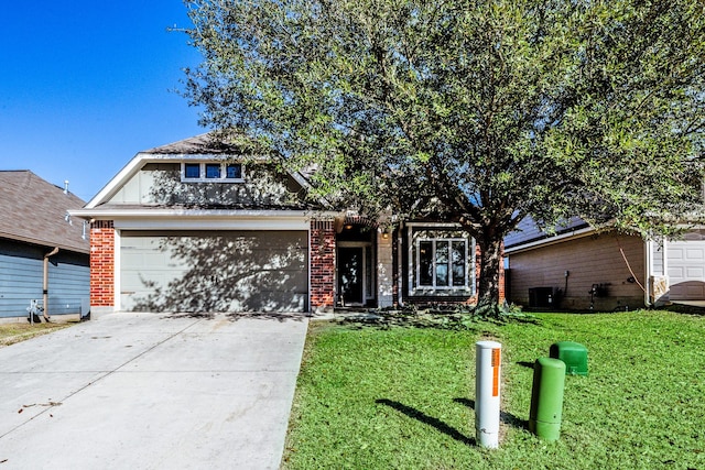 view of front of property featuring a garage, driveway, brick siding, and a front lawn