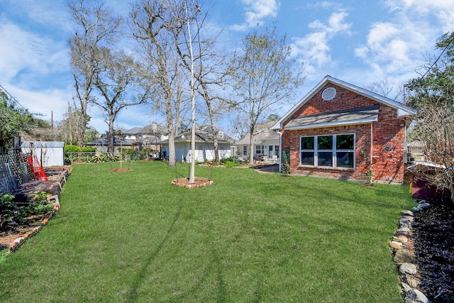 view of yard with fence