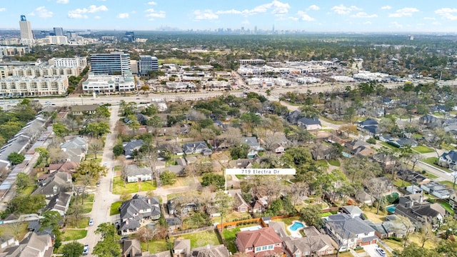 birds eye view of property with a city view