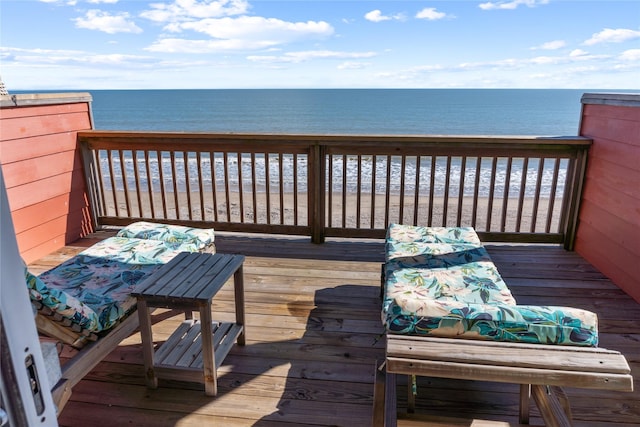 deck featuring a water view