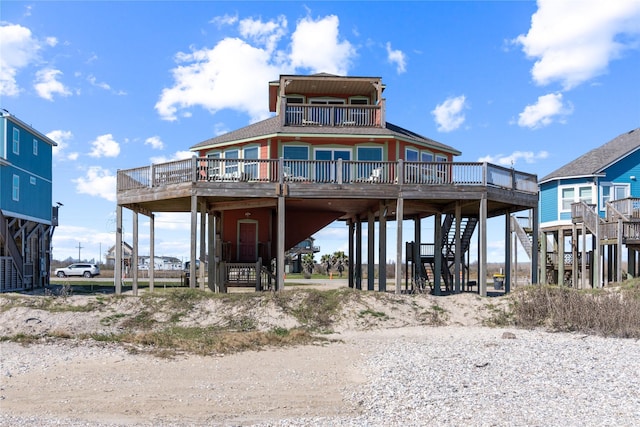 rear view of house featuring a carport