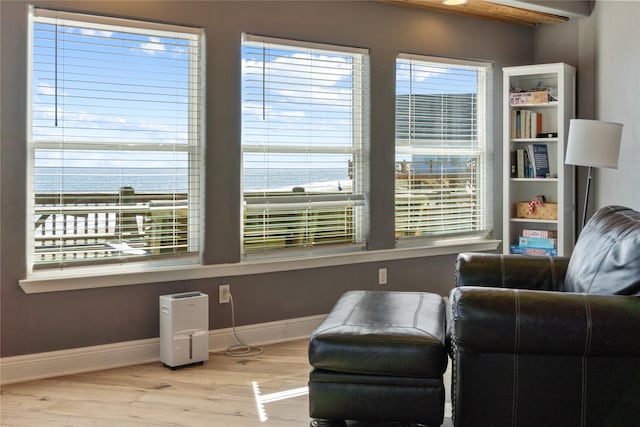 sitting room featuring wood finished floors and baseboards