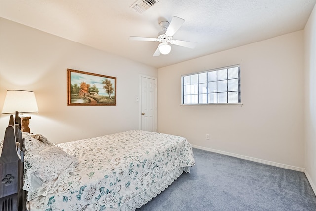 carpeted bedroom featuring visible vents, ceiling fan, and baseboards