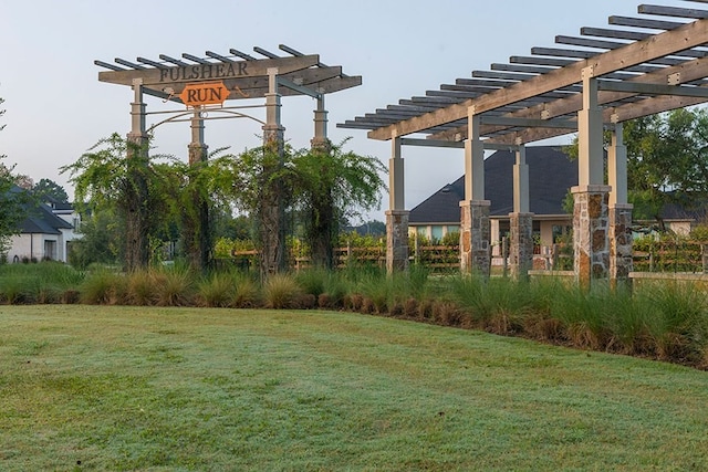 8533 Bois Darc Ln, Richmond, TX 77406 - view of grassy yard featuring a pergola