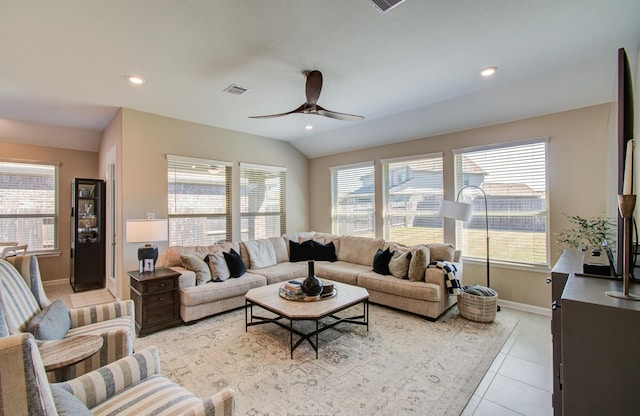 living room featuring light tile patterned floors, vaulted ceiling, a ceiling fan, and recessed lighting