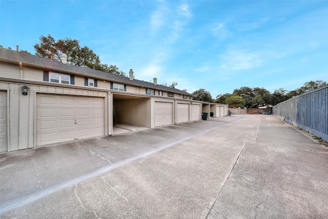 garage with fence