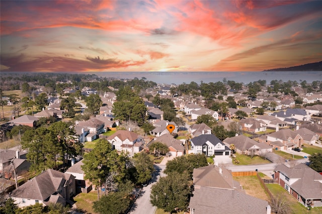 8707 Rolling Rapids Rd, Humble, TX 77346 - aerial view at dusk of a residential view