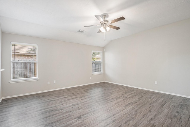 24134 Griffin House Ln, Katy, TX 77493 - spare room with wood finished floors, ceiling fan, and vaulted ceiling