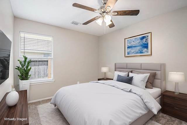 24134 Griffin House Ln, Katy, TX 77493 - bedroom with multiple windows, carpet floors, and a ceiling fan