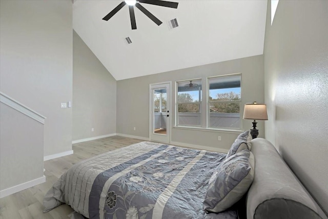 bedroom with ceiling fan, visible vents, baseboards, vaulted ceiling, and light wood finished floors