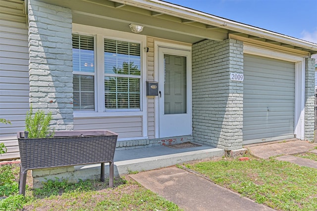 2009 Neumann Dr, Galveston, TX 77551 - property entrance with brick siding and covered porch