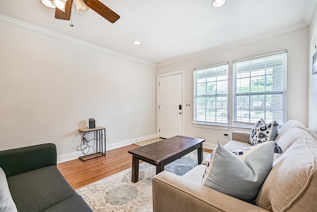 2009 Neumann Dr, Galveston, TX 77551 - living room featuring crown molding, ceiling fan, wood finished floors, baseboards, and recessed lighting