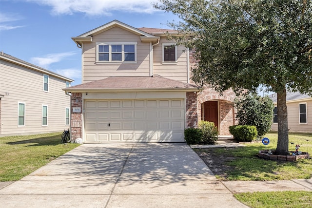 traditional home with a garage, a front yard, brick siding, and driveway