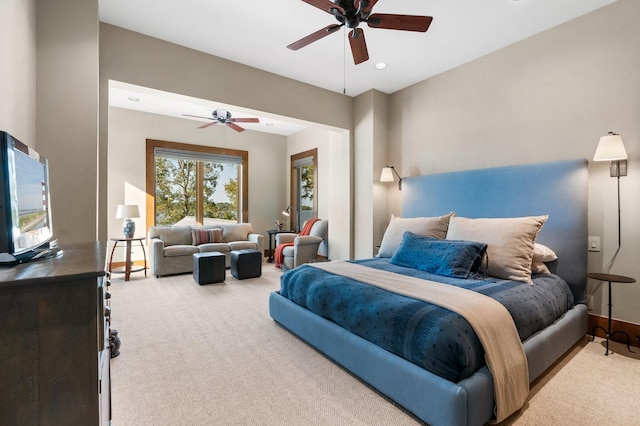 carpeted bedroom with a ceiling fan, recessed lighting, and baseboards