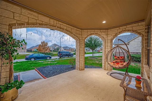 view of patio with a residential view