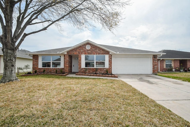 ranch-style home featuring a garage, a front yard, concrete driveway, and brick siding