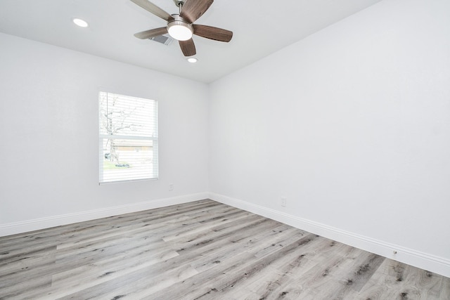 unfurnished room with light wood-style flooring, recessed lighting, visible vents, a ceiling fan, and baseboards