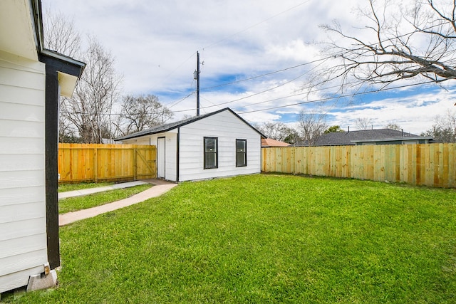 view of outbuilding with a fenced backyard