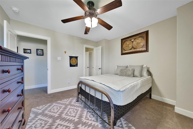 bedroom featuring carpet, a ceiling fan, and baseboards