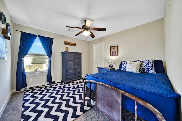 bedroom with a ceiling fan, carpet, visible vents, and baseboards