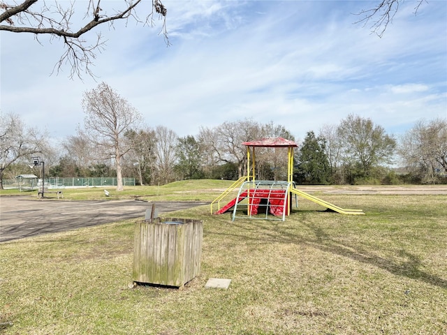 view of jungle gym featuring a yard