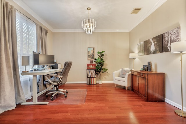 office area featuring baseboards, visible vents, ornamental molding, wood finished floors, and a notable chandelier