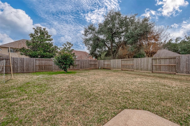 view of yard featuring a fenced backyard