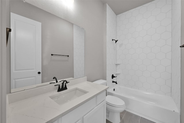 bathroom featuring shower / bathing tub combination, vanity, and toilet