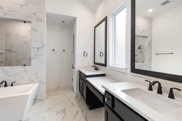 bathroom with marble finish floor, a sink, visible vents, and recessed lighting