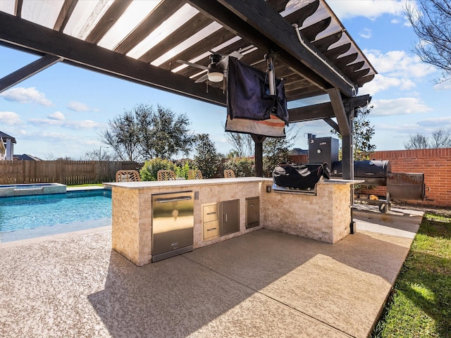 view of patio with ceiling fan, exterior kitchen, a fenced backyard, and a grill