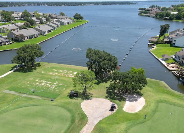 bird's eye view with a water view and a residential view