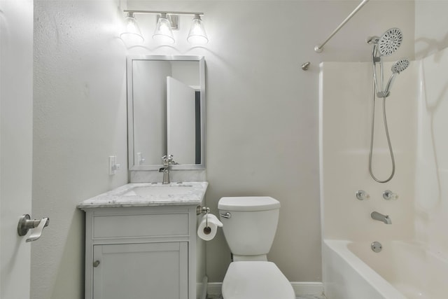 full bath with toilet, bathing tub / shower combination, baseboards, and vanity