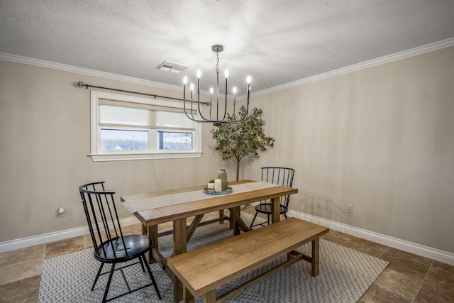 dining room featuring an inviting chandelier, baseboards, visible vents, and ornamental molding