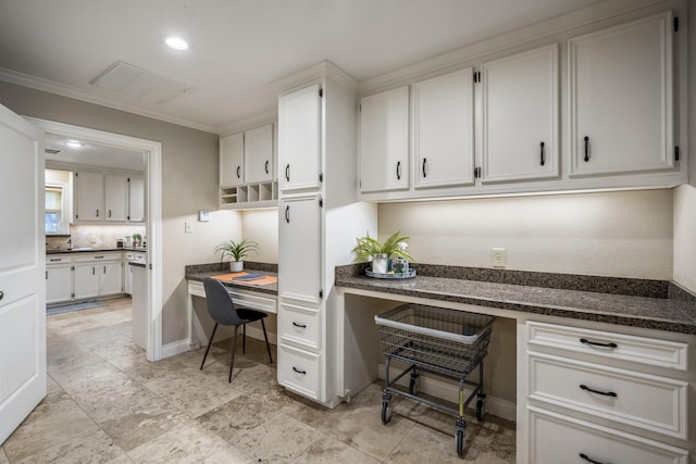 office area featuring recessed lighting, visible vents, ornamental molding, built in study area, and baseboards