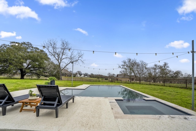 view of swimming pool featuring a fenced backyard, a patio, a lawn, and an in ground hot tub