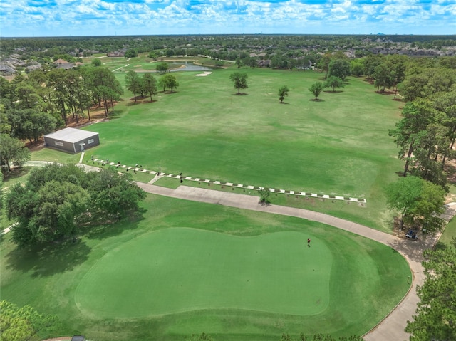 drone / aerial view featuring view of golf course