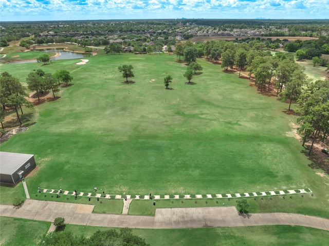 aerial view with a water view and golf course view