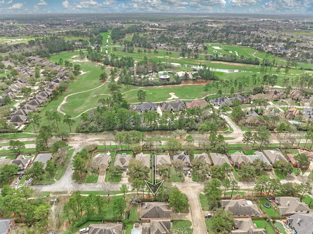 aerial view featuring a residential view and golf course view