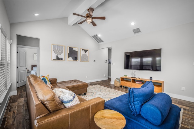 living area with wood finished floors, visible vents, and baseboards