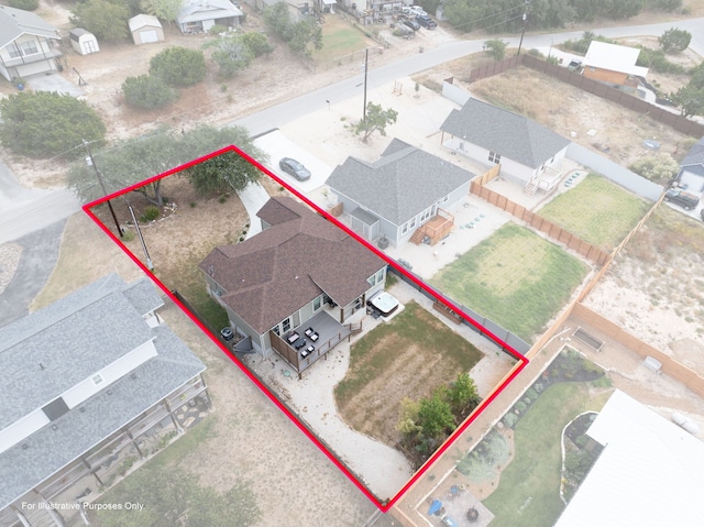 birds eye view of property with a residential view