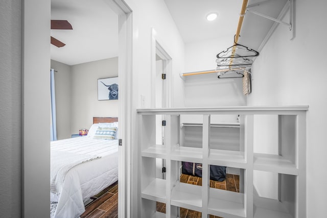 interior space with wood tiled floor and ceiling fan