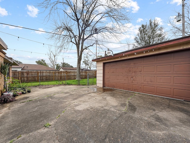 garage with fence