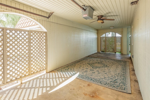 exterior space featuring a ceiling fan