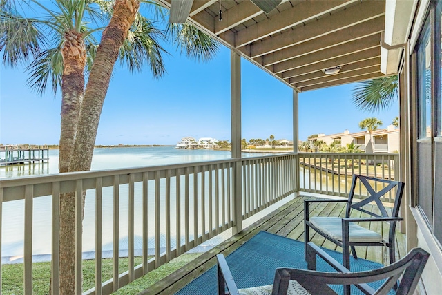 balcony featuring a water view