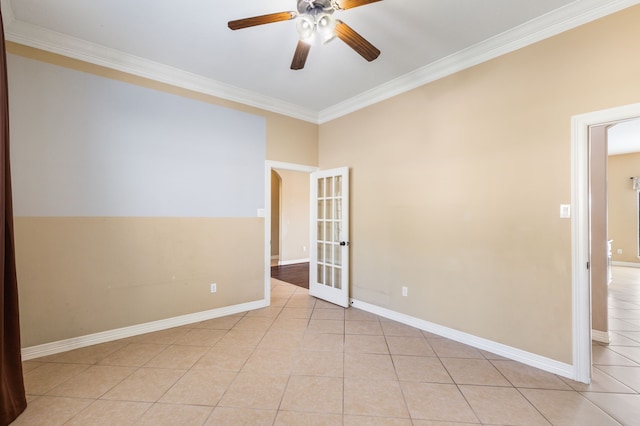 unfurnished room featuring ceiling fan, baseboards, light tile patterned flooring, and crown molding